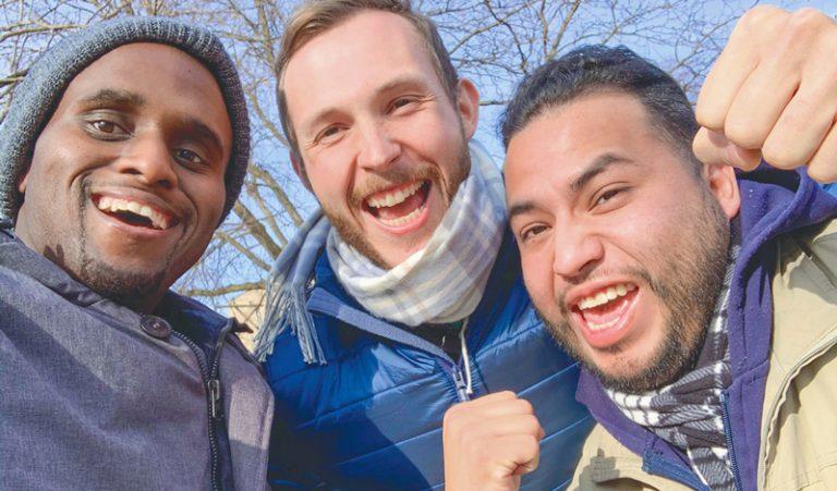 Young men taking a selfie together